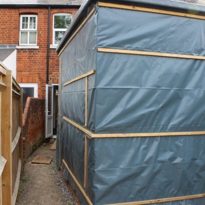 External view of extension wrapped and secured