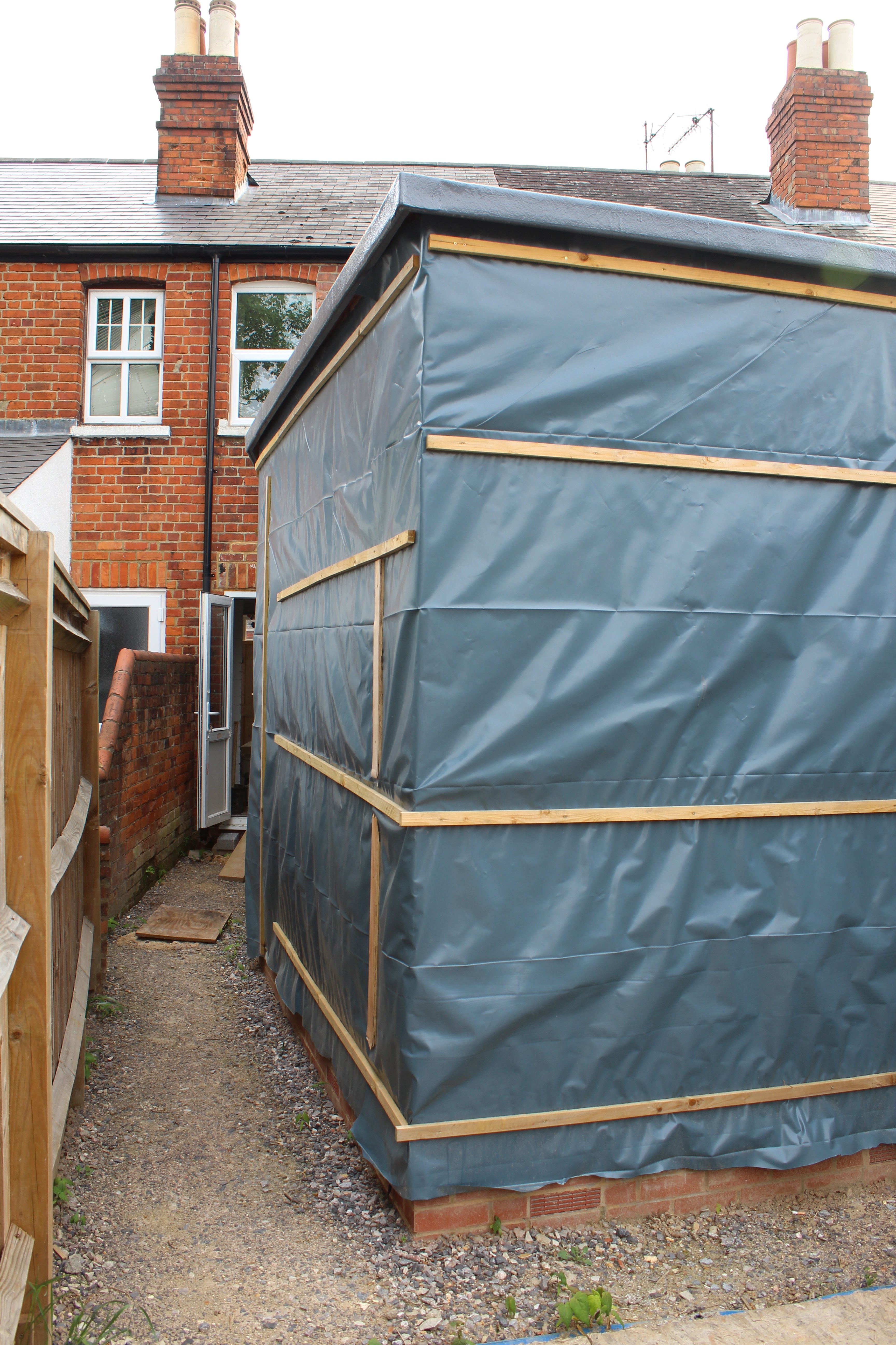 External view of extension wrapped and secured